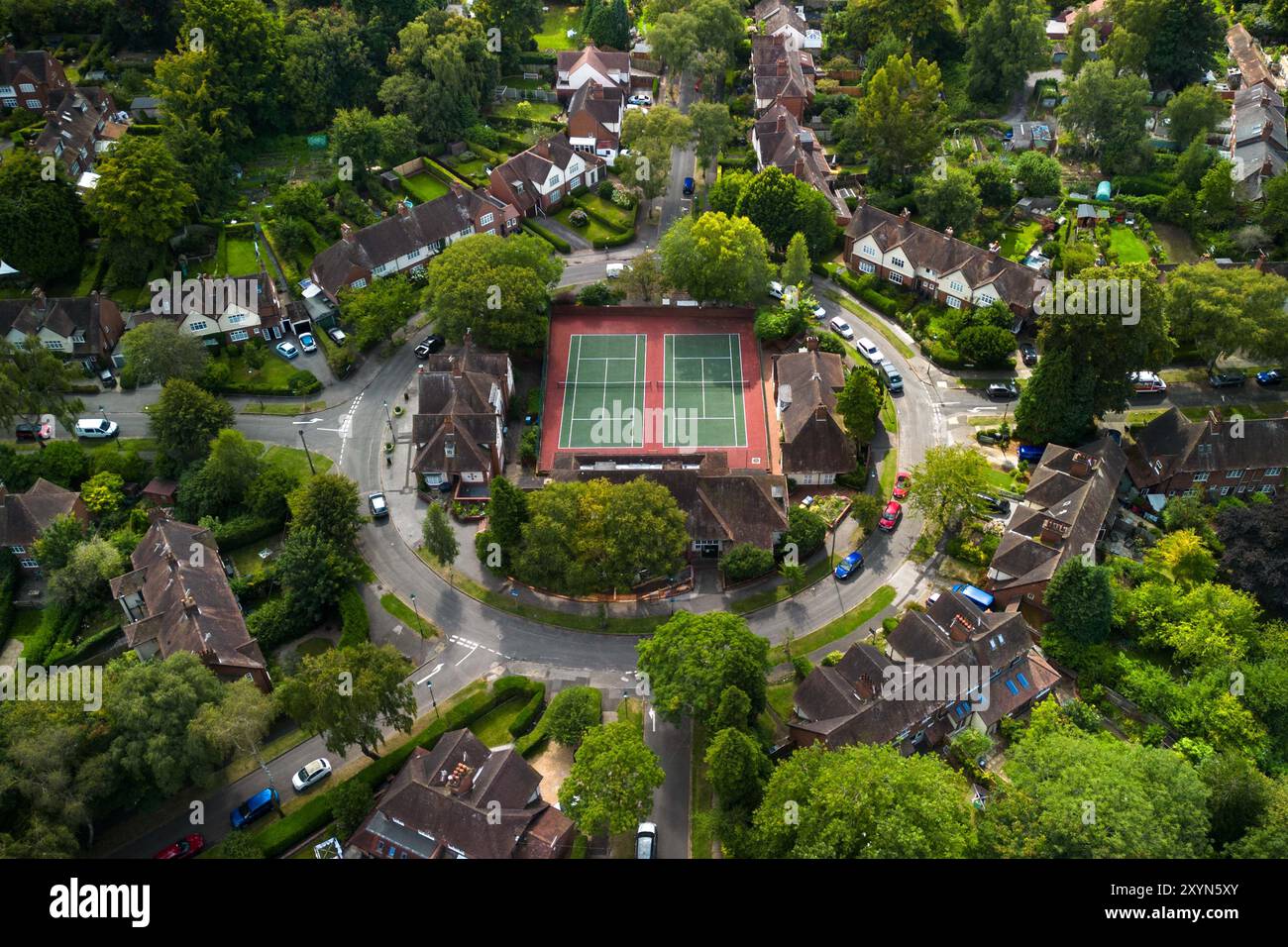 Harborne, Birmingham, 30th August 2024. The Circle Tennis Club in Harborne is unique as it is within a roundabout surrounded by a leafy housing estate. The club dates back to 1918. It was originally built as the Moor Pool Estate village green at the hears of The Circle and was used for festivities and special occasions. Pic by Credit: Stop Press Media/Alamy Live News Stock Photo