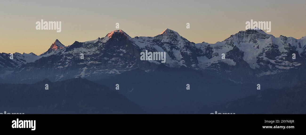 Famous mountains Eiger Monch and Jungfrau. Morning scene in Switzerland ...