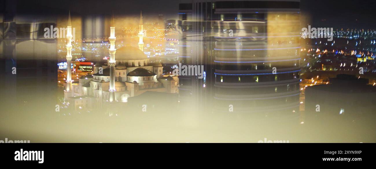 View of Fujairah City in the night. United Arab Emirates, Middle East. Double exposure Stock Photo