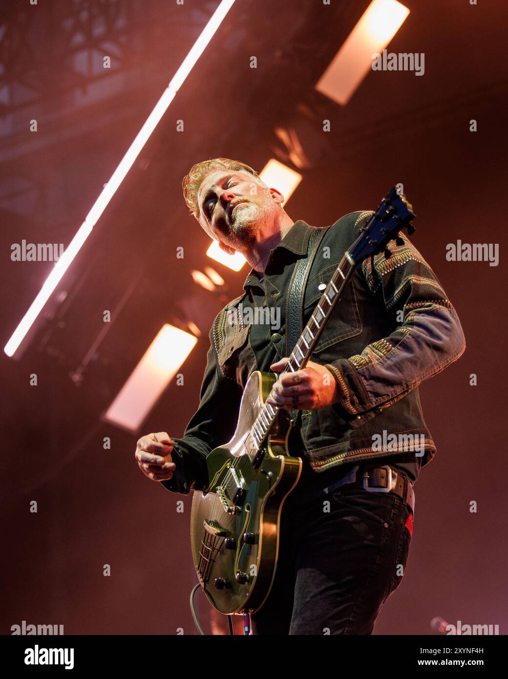 BARCELONA, SPAIN - JUN 26: Josh Homme, frontman of Queens of the Stone Age (American rock band), performs on stage at Poble Espanyol on June 26, 2024. Stock Photo