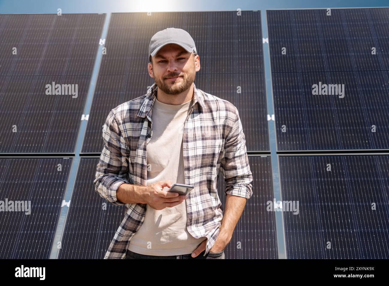 Production, installation and maintenance of industrial solar panels. Stock Photo