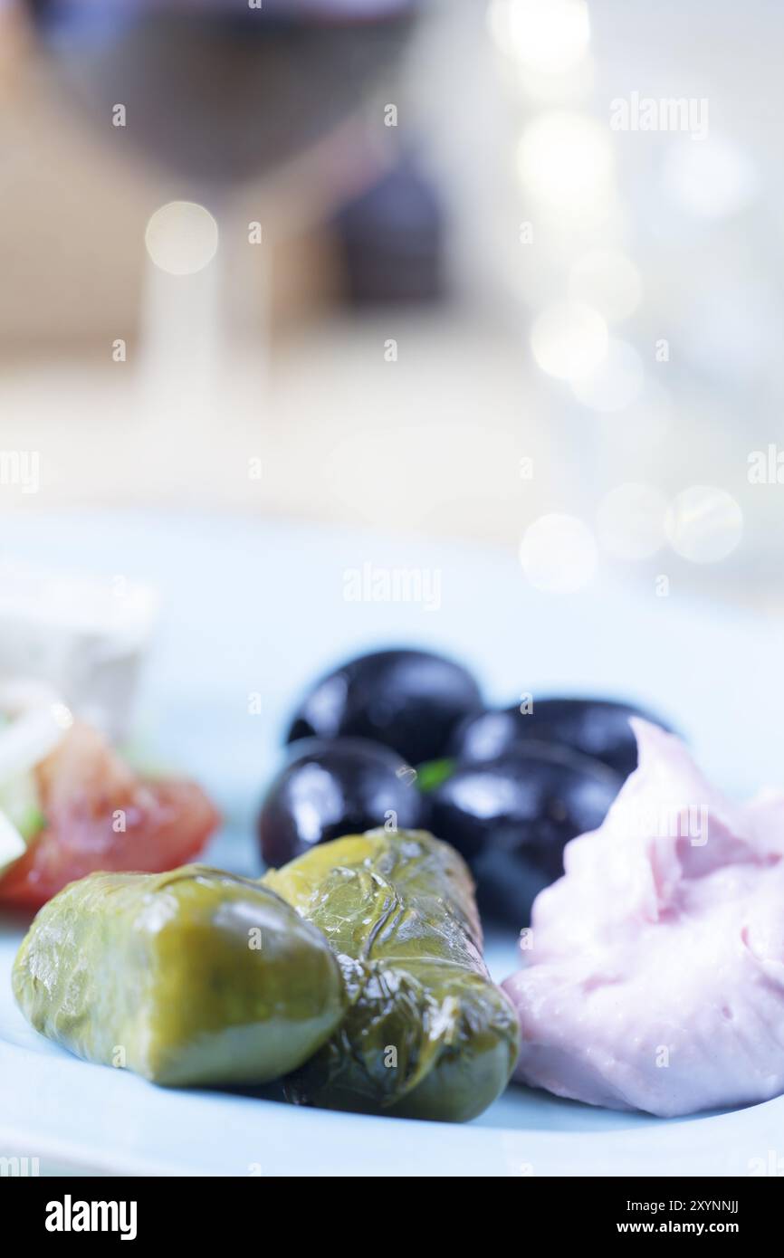 Greek taramas and stuffed vine leaves with salad Stock Photo - Alamy