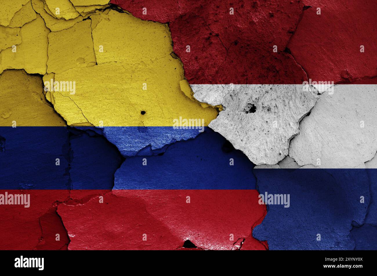 Flags of Colombia and Netherlands painted on cracked wall Stock Photo ...