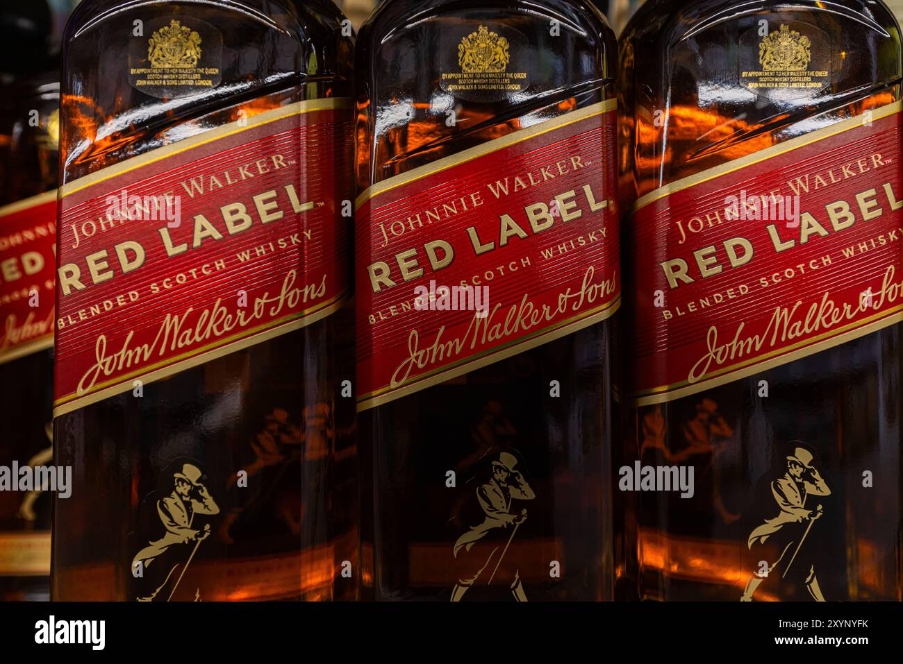 Lviv, Ukraine - August 26, 2024: Johnnie Walker Red Label Blended Scotch Whisky bottles Stock Photo