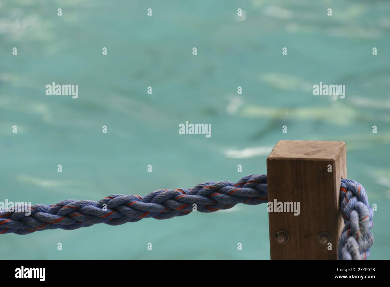Rope barrier at the edge of a swimming pool Stock Photo - Alamy