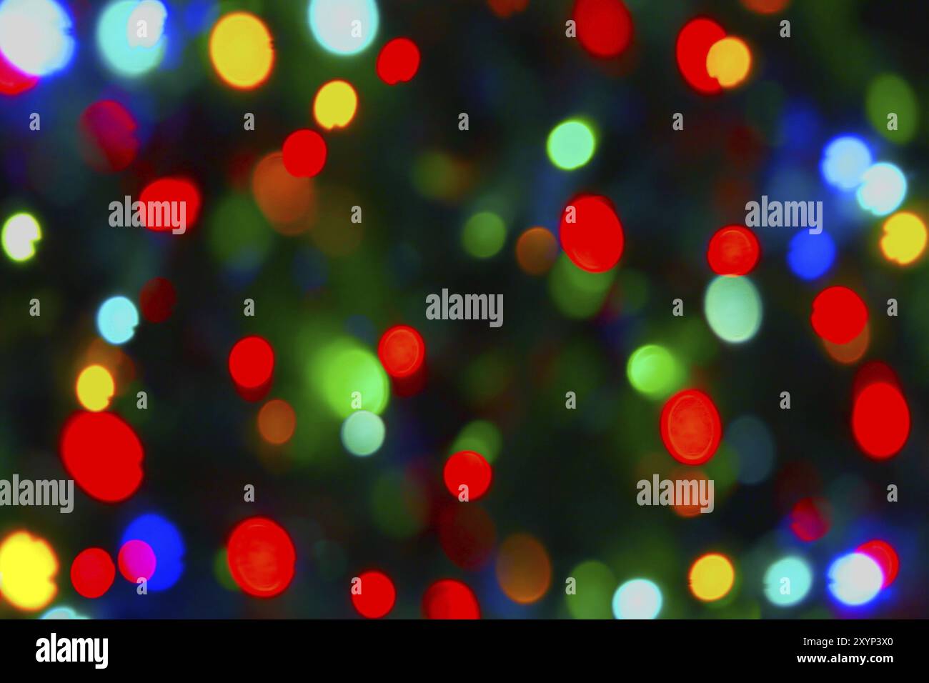 Holiday background from color unfocused lights Stock Photo