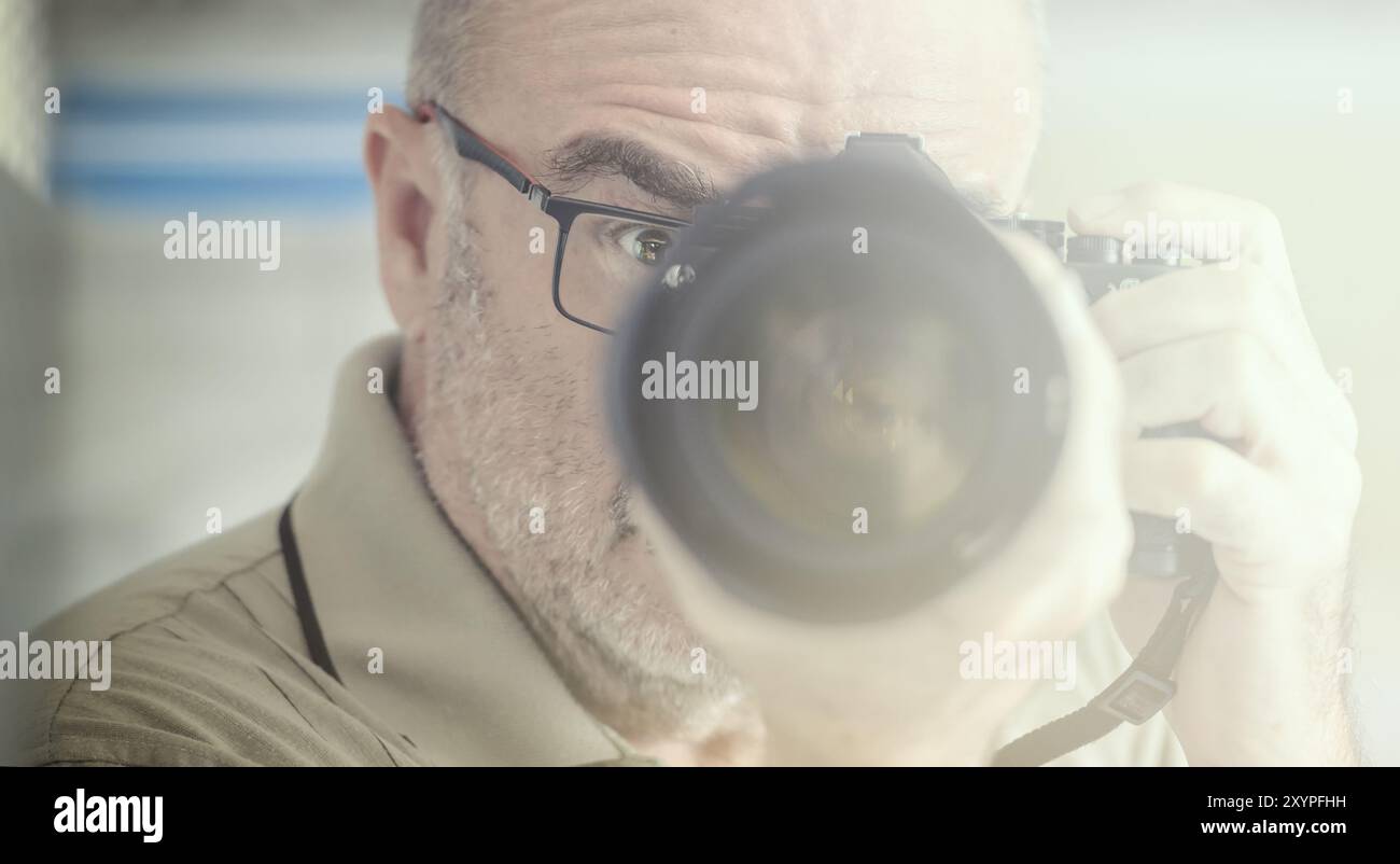 Portrait of a photographer in stray light Stock Photo