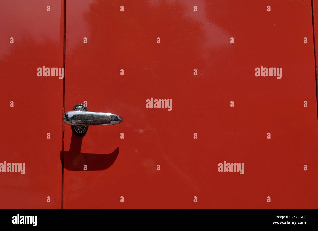 Door of a fire engine with chrome handle Stock Photo - Alamy