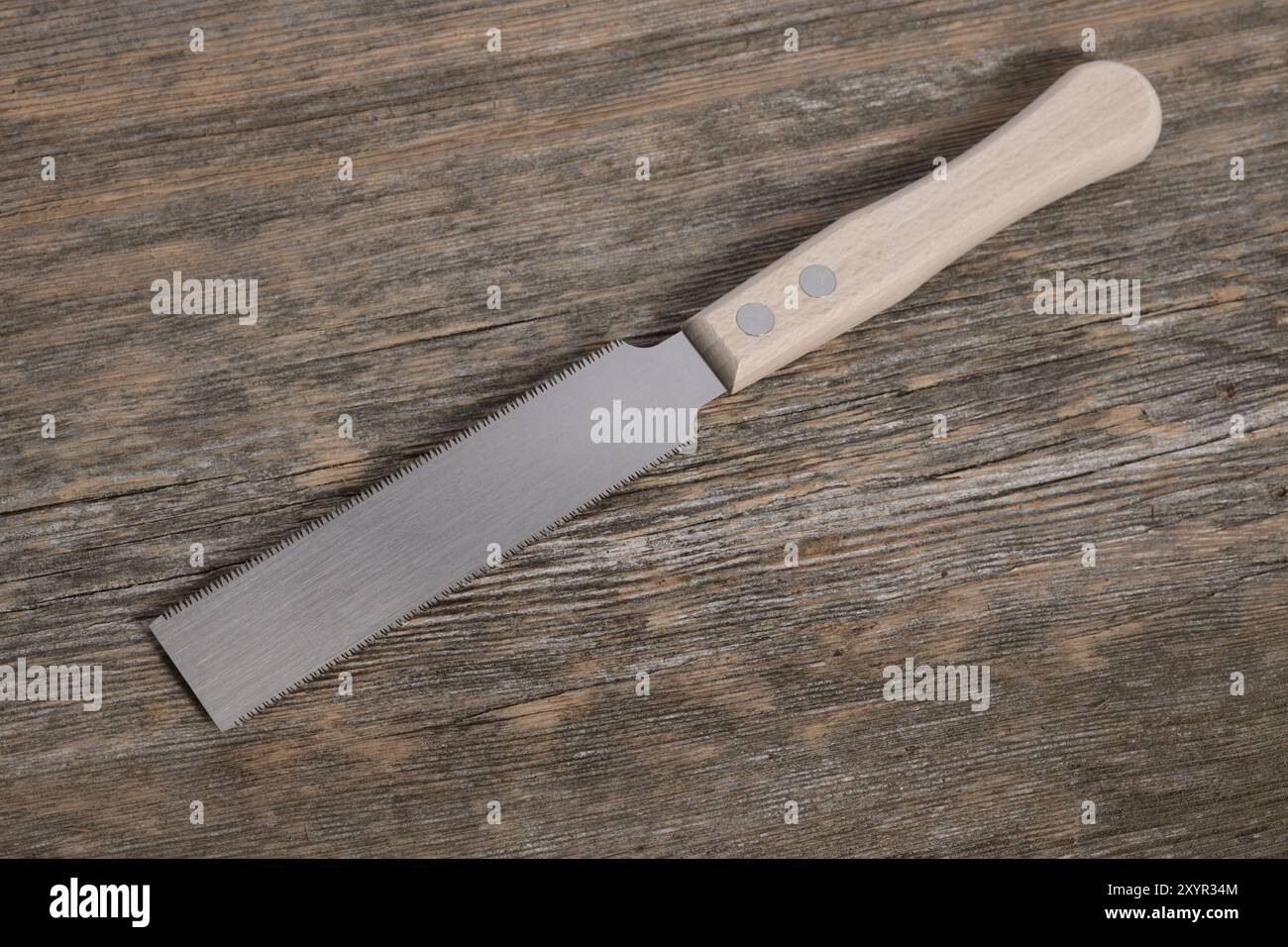 Kugihiki, Japanese flush cutting double edged wood hand saw, both, ripping and crosscut saw in one Stock Photo