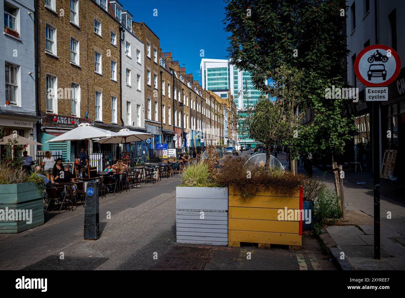 Warren Street with University College Hospital UCH London at the end of the street in Central London Stock Photo