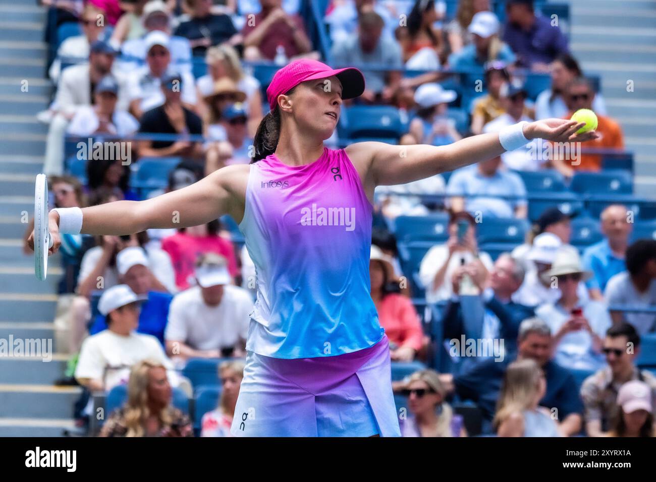 Iga Swiatek (POL) competes in round 1 of the 2024 US Open Tennis Stock