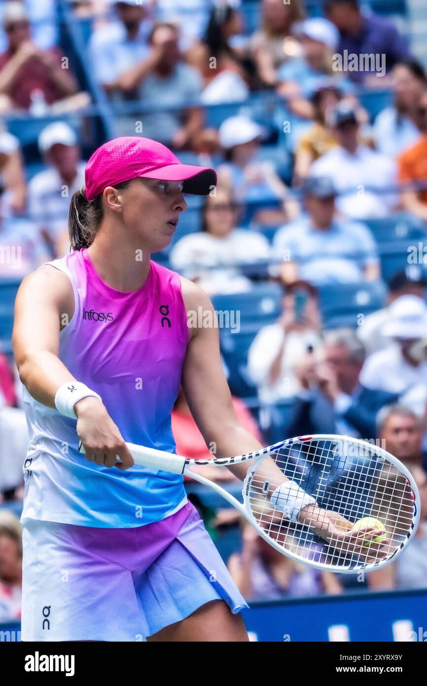 Iga Swiatek (POL) competes in round 1 of the 2024 US Open Tennis Stock ...