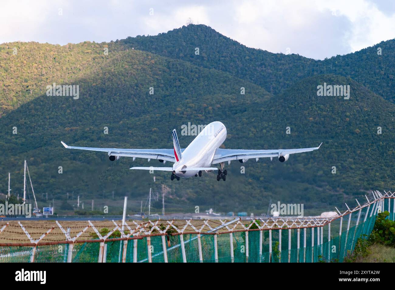 Princess Juliana Airport 1-13-2008 Simpson Bay Saint Martin  Air France Airbus A340-300 F-GLZO evening departure out of Princess Juliana Intl. Airport Stock Photo