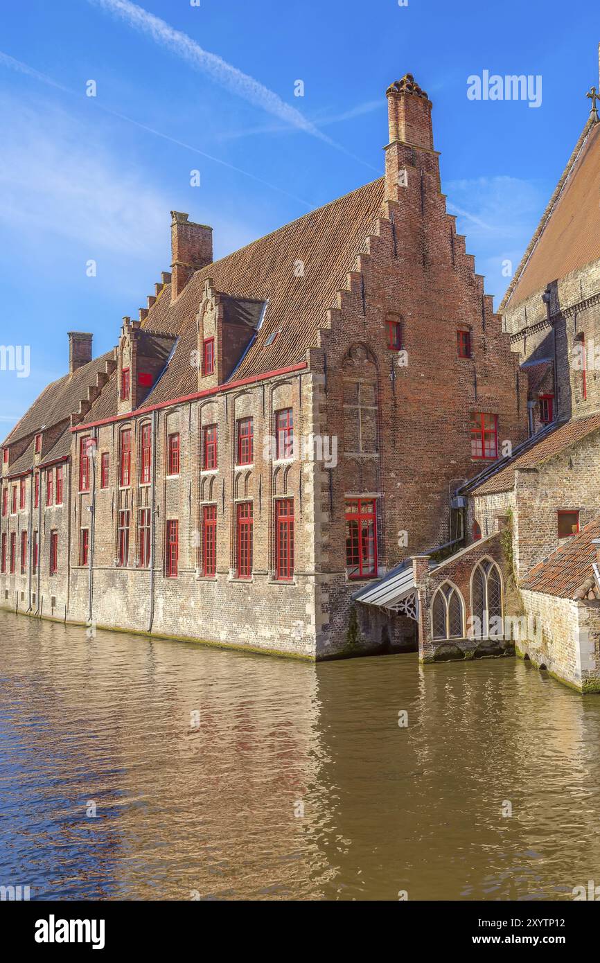 Bruges, Belgium hospital of St. John or Sint-Janshospitaal and canal in the old town of Brugge Stock Photo