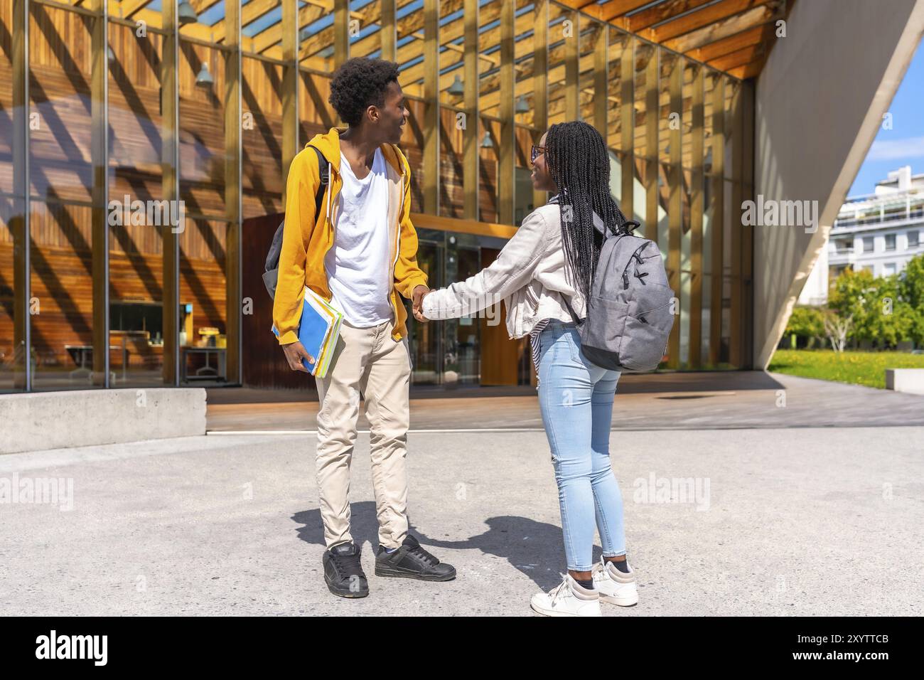 African children holding hands hi-res stock photography and images - Alamy