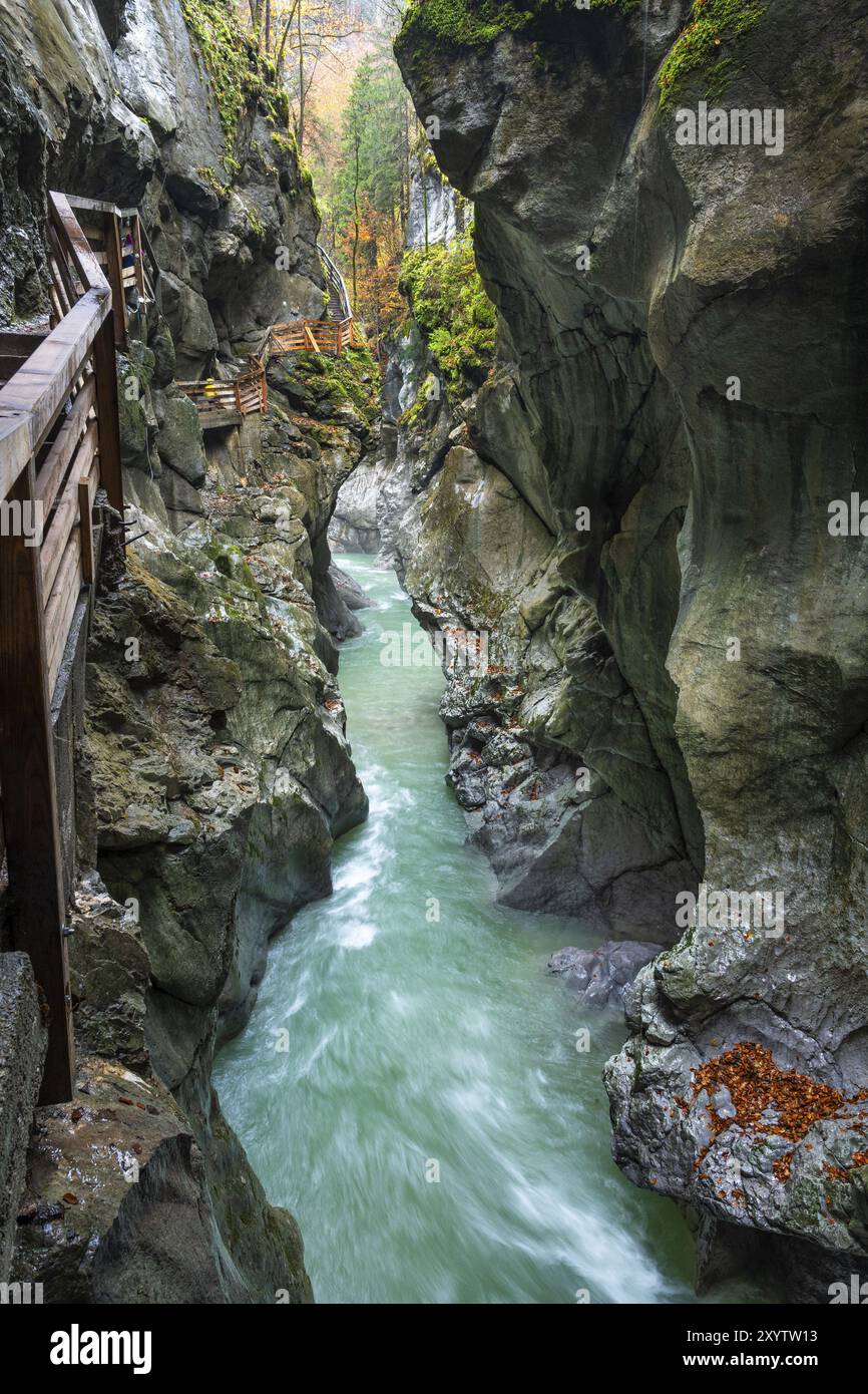 The River Lammer In The Gorge Lammerklamm Lammeroefen A Path Leads the-river-lammer-in-the-gorge-lammerklamm-lammeroefen-a-path-leads
