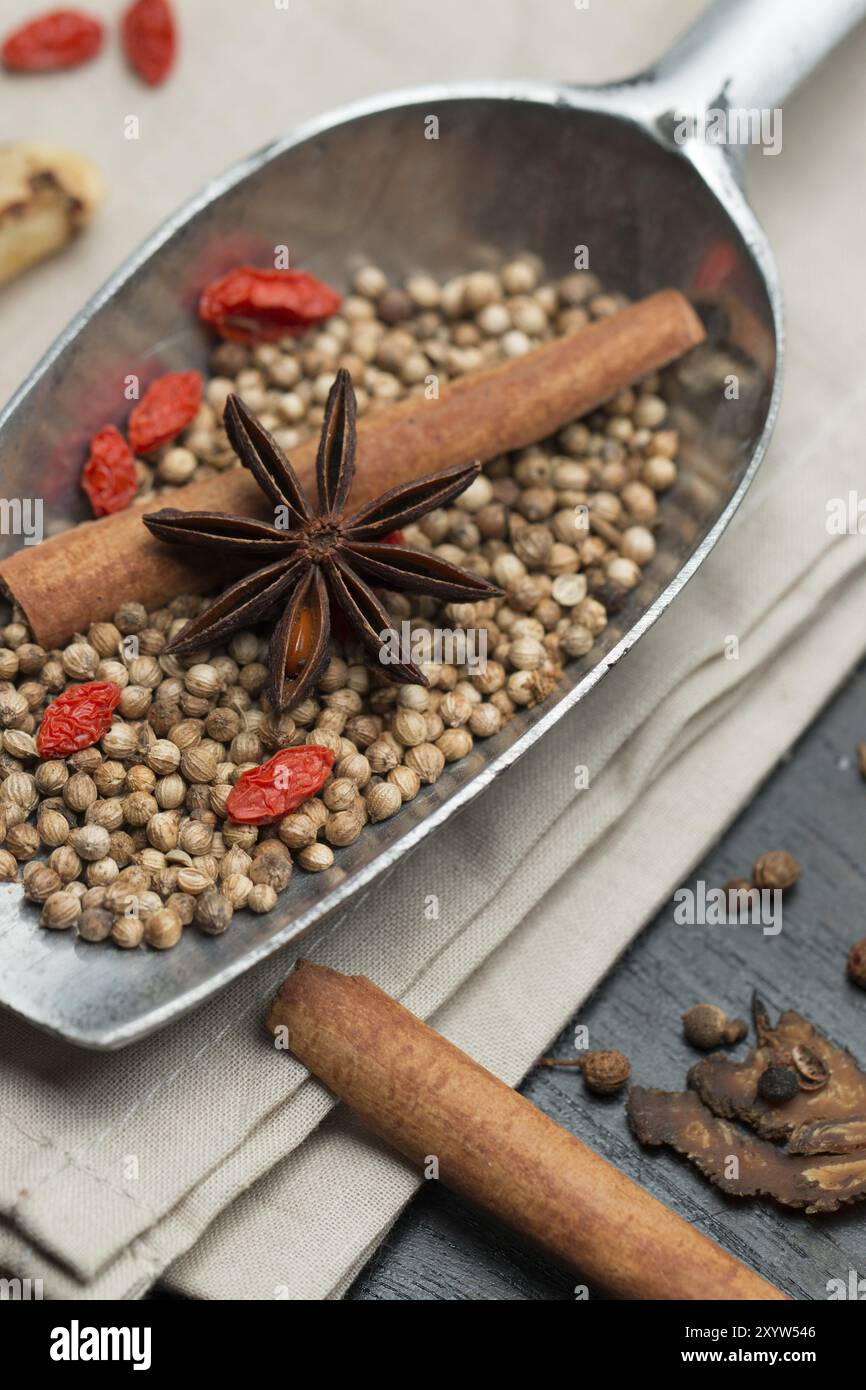 Macro closeup Spices and herbs on black wood background Stock Photo