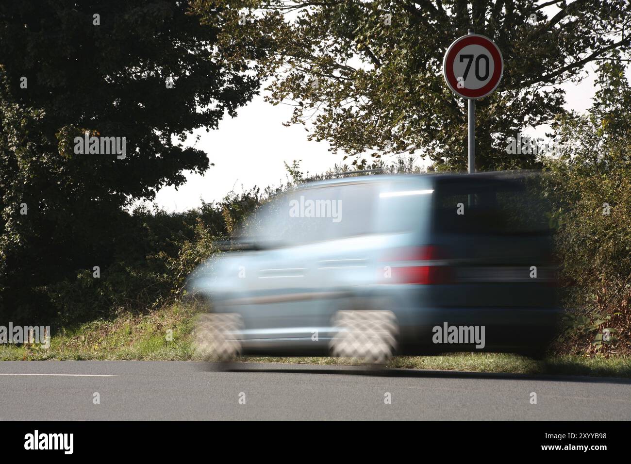 Speeding in front of a 70 km/h sign Stock Photo - Alamy
