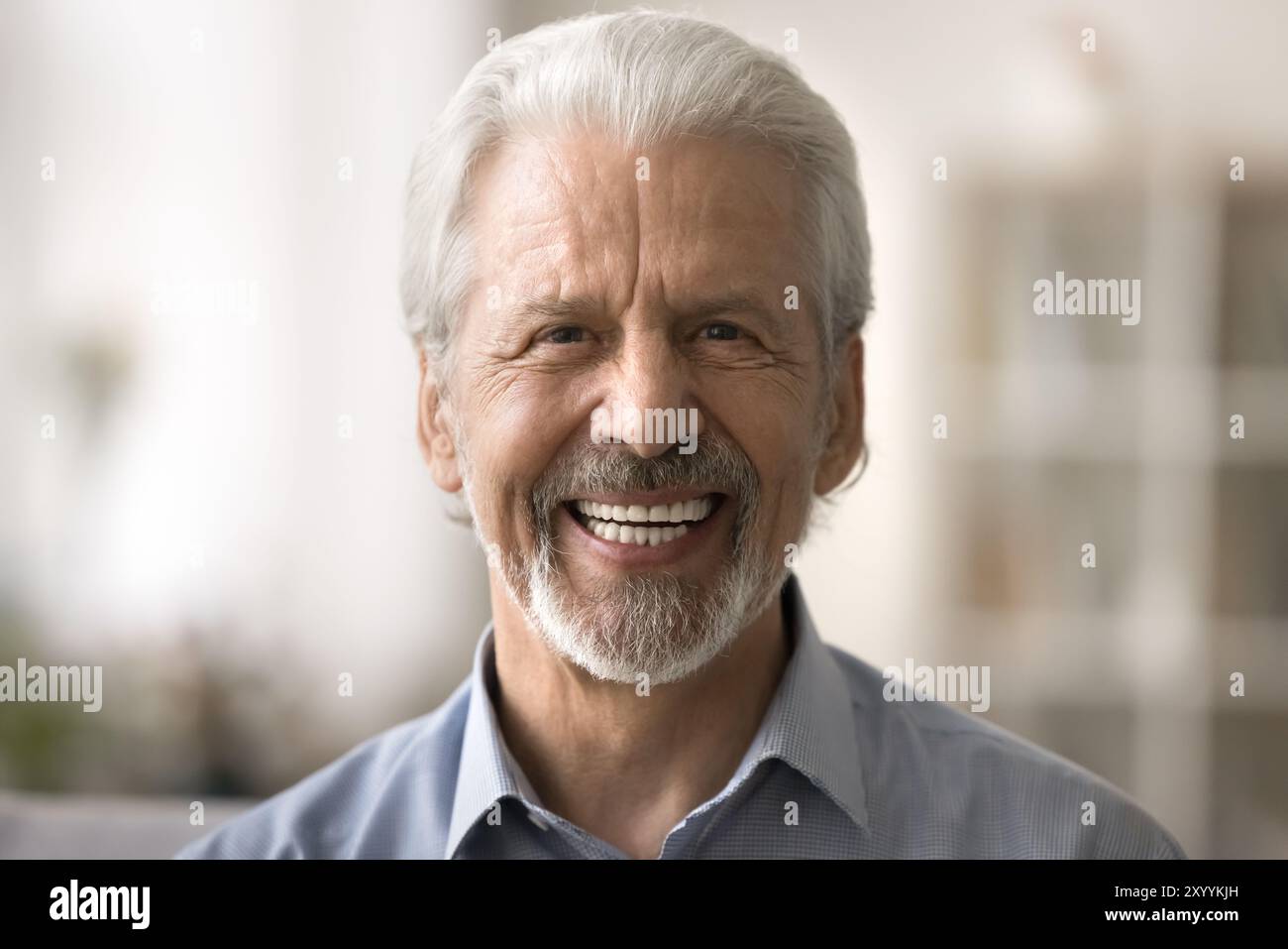 Close up portrait of happy elderly man Stock Photo