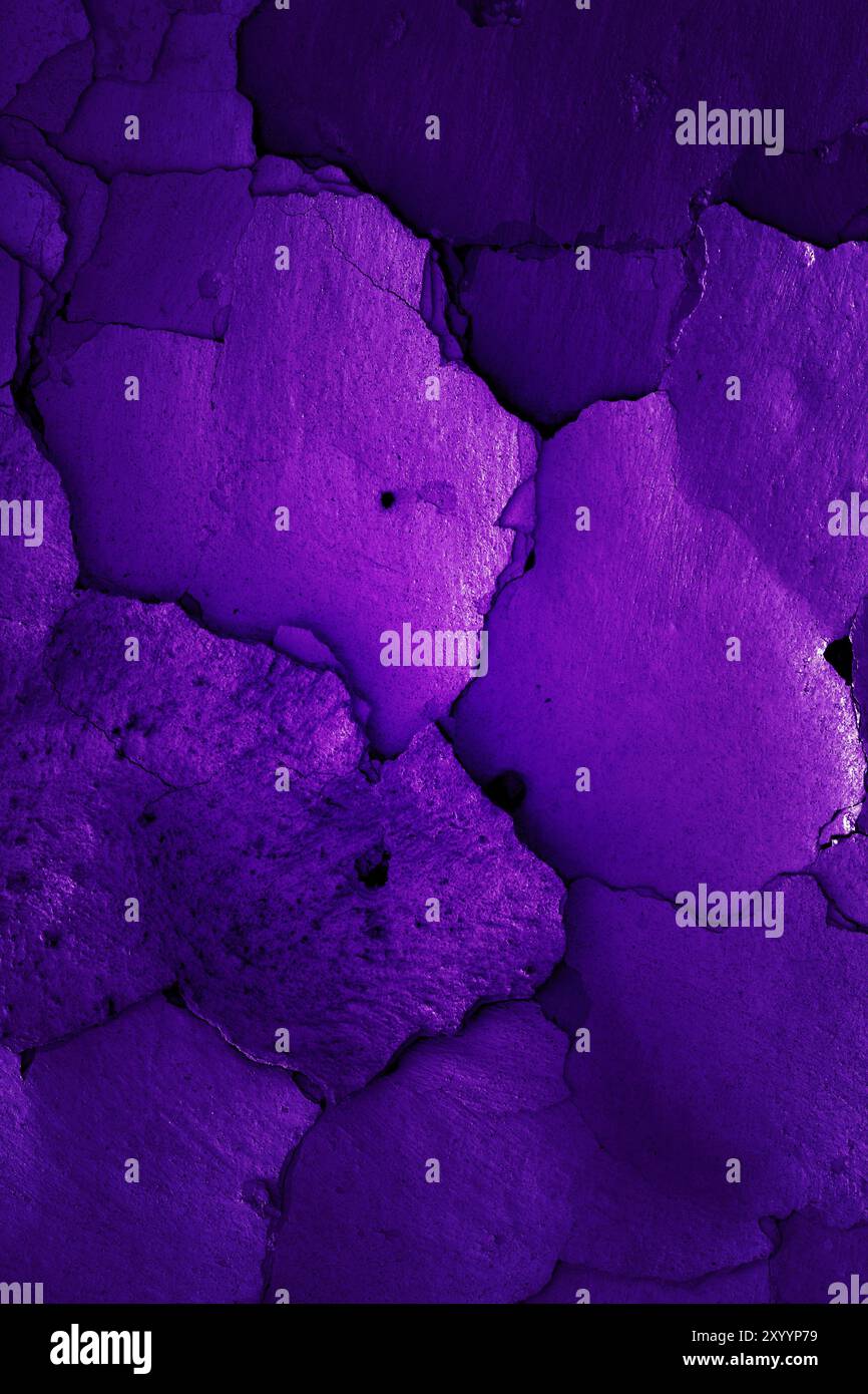 Old cracked wall in grape color Stock Photo