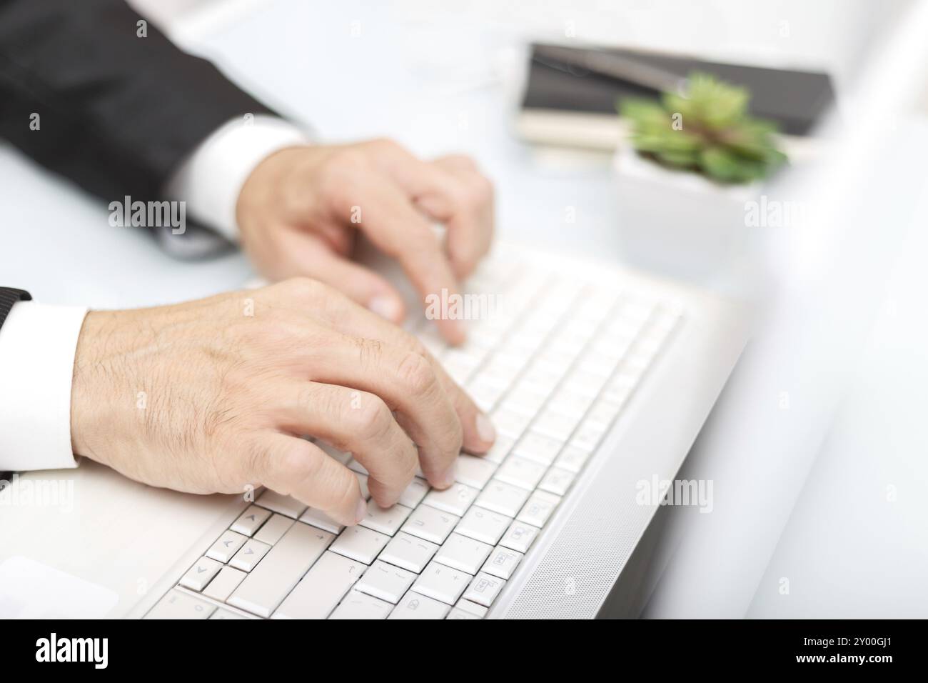 Male hands using modern computer typing on keyboard business concept Stock Photo