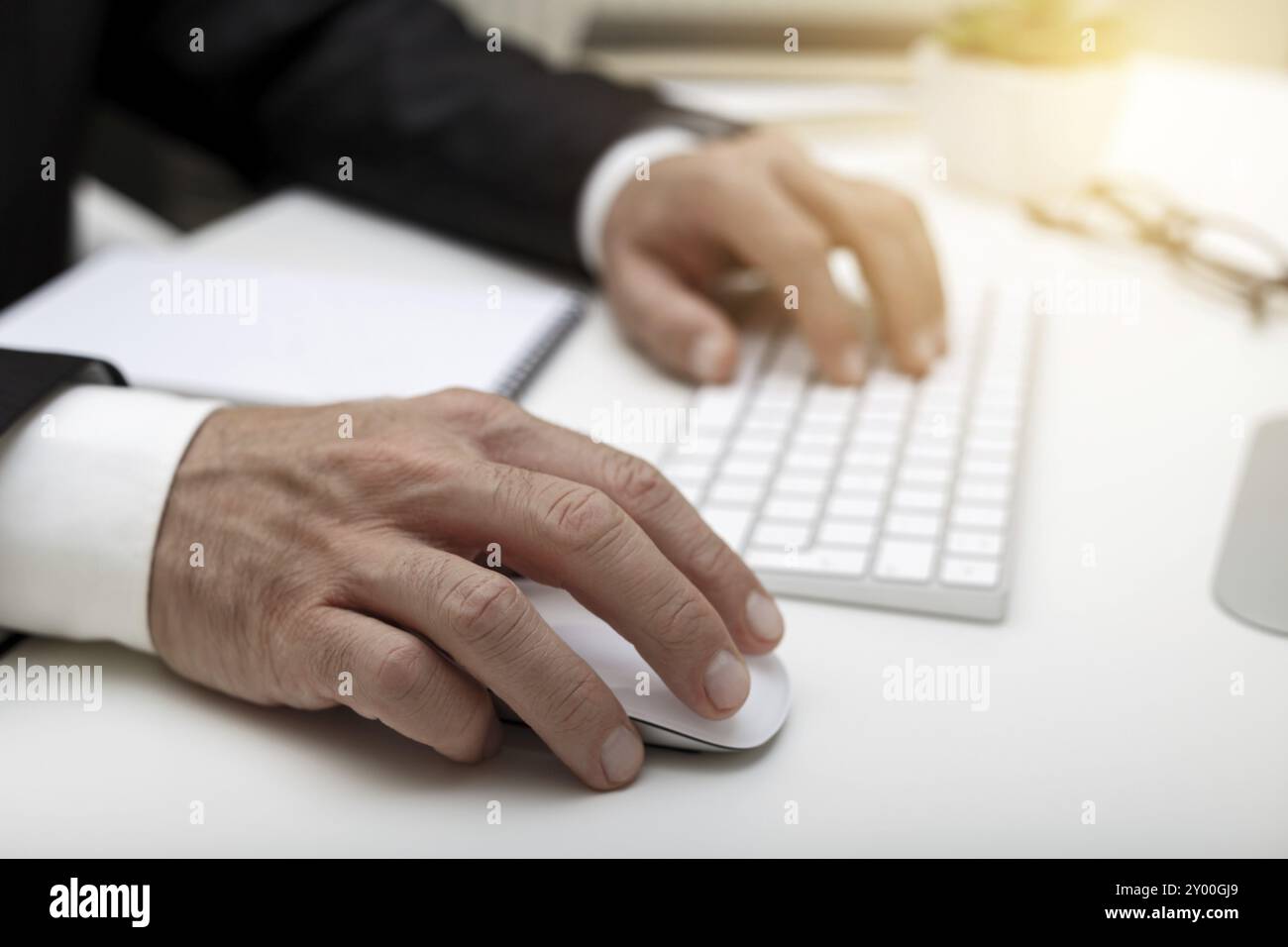 Male hands using modern computer typing on keyboard business concept Stock Photo