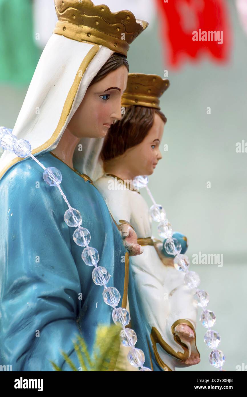 Religious image depicting Our Lady, mother of Jesus with her child on her lap Stock Photo