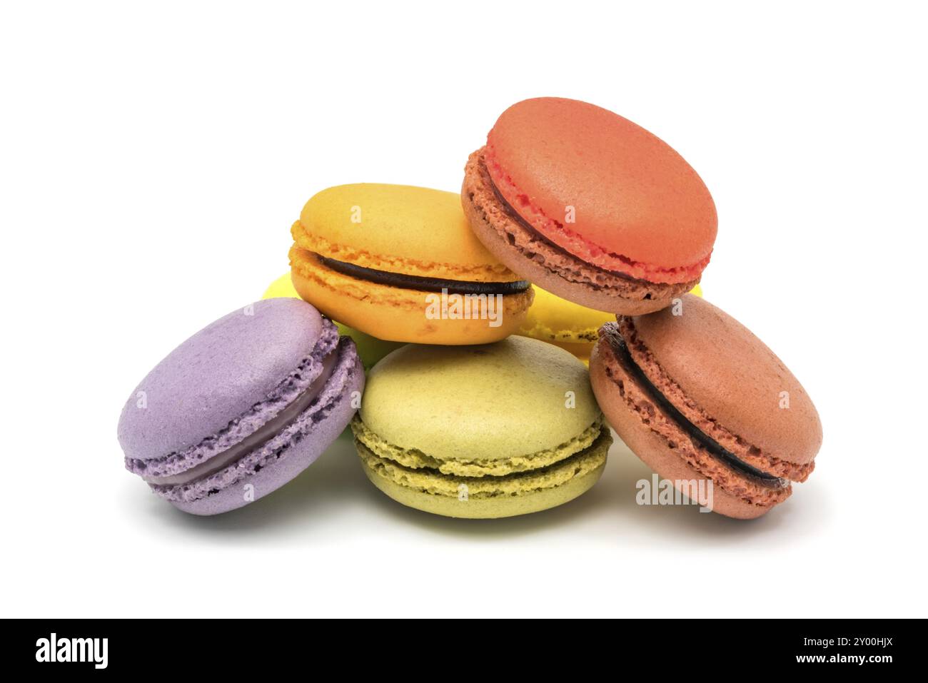 Pile of colorful sweet macarons on white background Stock Photo