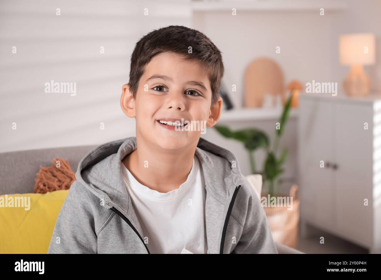 Portrait of cute little boy at home Stock Photo - Alamy