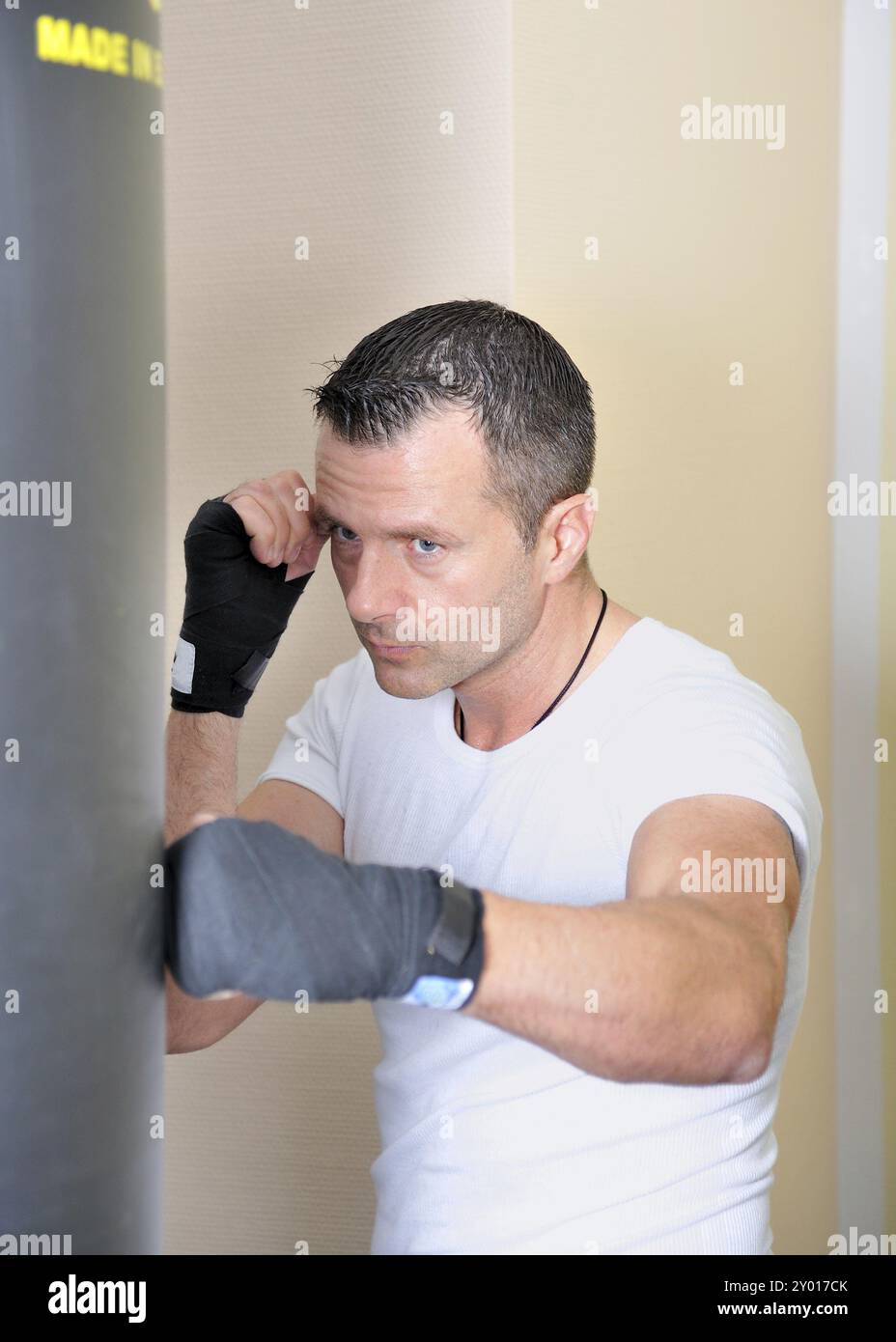 Male boxer practising punching hi-res stock photography and images - Alamy