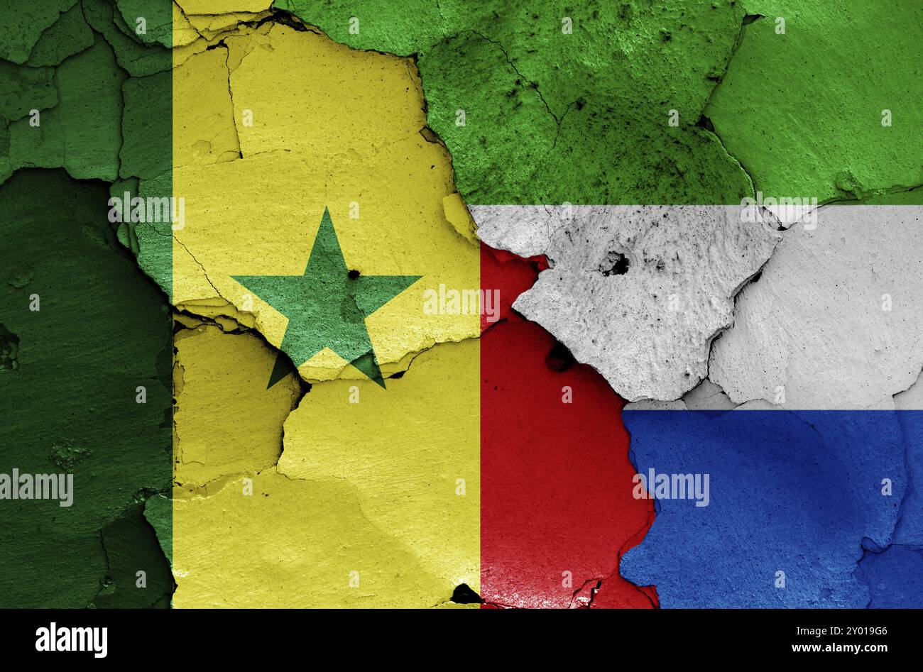 Flags of Senegal and Sierra Leone painted on cracked wall Stock Photo ...