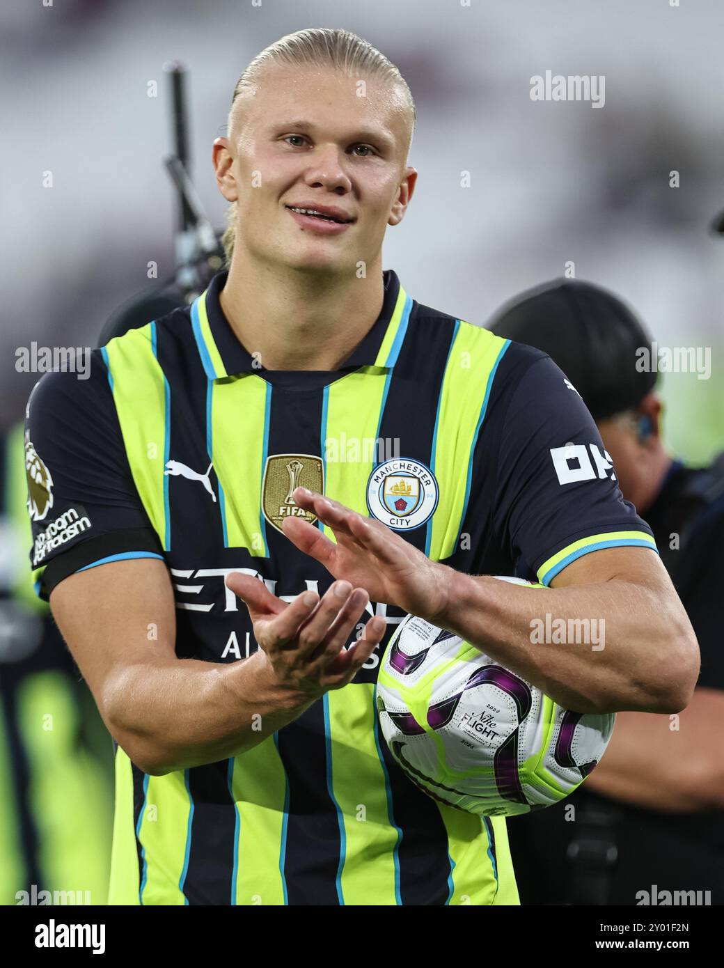 Erling Haaland of Manchester City applauds the traveling fans as