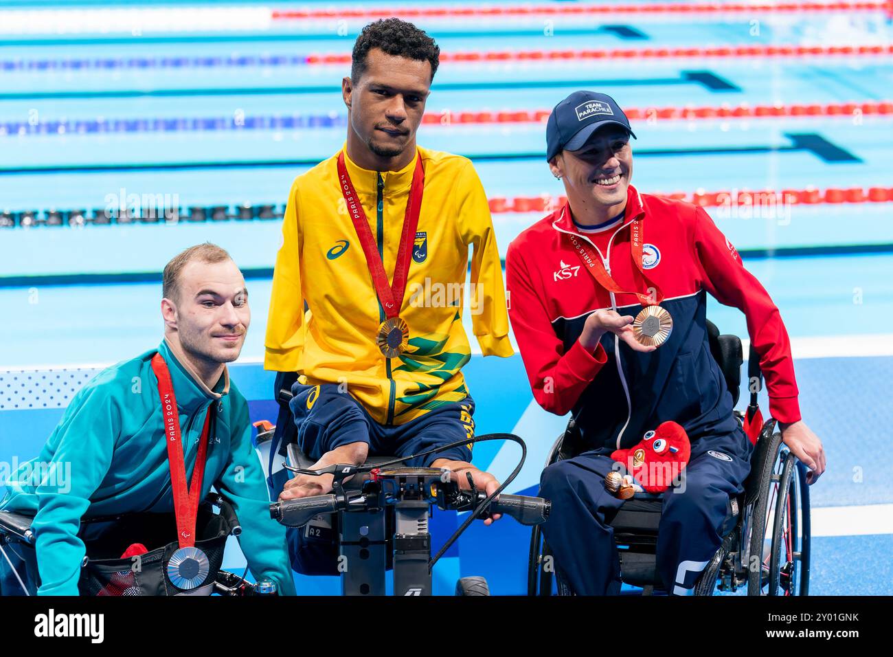 Nanterre, France. 31st Aug, 2024. NANTERRE, FRANCE - AUGUST 31: Vladimir Danilenko, Gabriel Geraldo dos Santos Araujo of Brazil and Alberto Caroly Abarza Diaz of Chile posing during the podium ceremony after competing in the Men's 50m Backstroke - S2 during Day 3 of Para Swimming - Paris 2024 Summer Paralympic Games at Paris La Defense Arena on August 31, 2024 in Nanterre, France. (Photo by Joris Verwijst/BSR Agency) Credit: BSR Agency/Alamy Live News Stock Photo