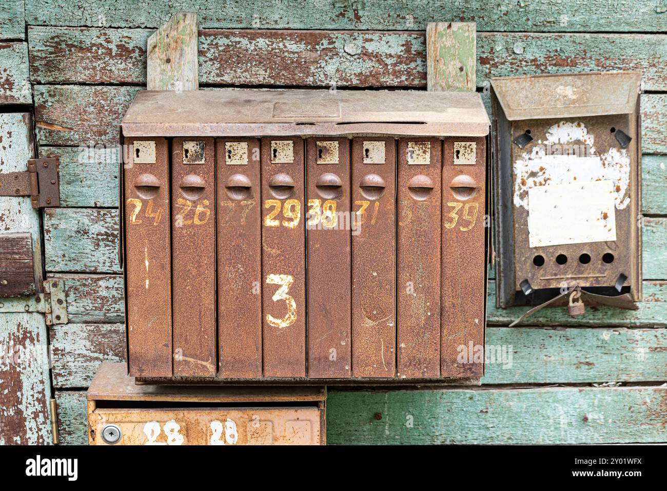 old mailboxes hanging on the wall Stock Photo