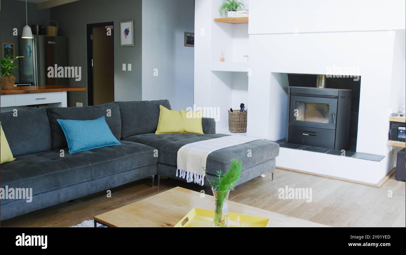 Stylish interior of living room with soft sofa and coffee table ...