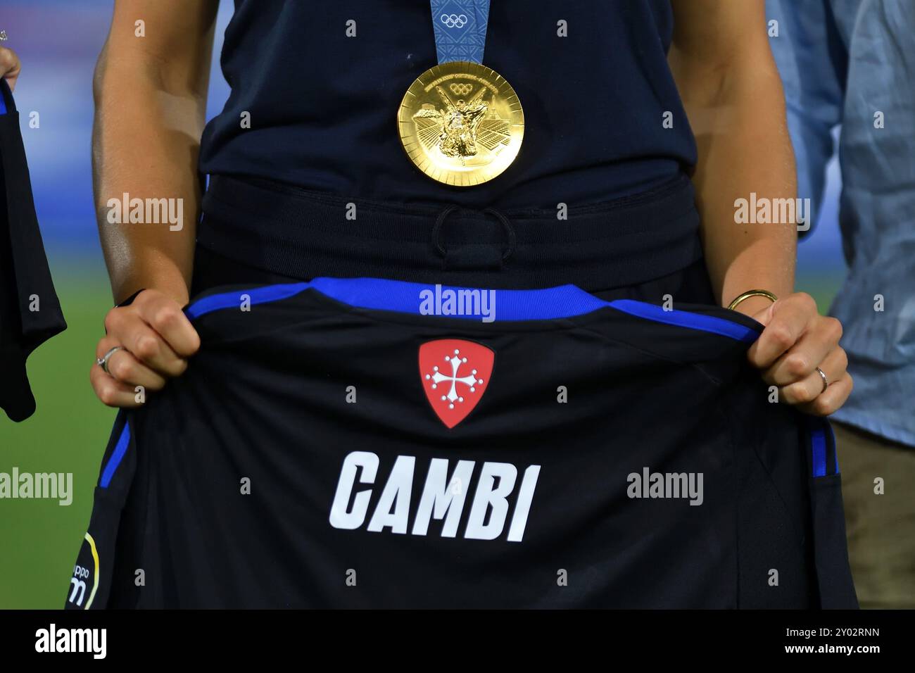 Carlotta Cambi, volleyball gold medal at the Olympics&#xD;&#xA;Games in Paris 2024, with celebratory shirt. during AC Pisa vs AC Reggiana, Italian soccer Serie B match in Pisa, Italy, August 31 2024 Stock Photo