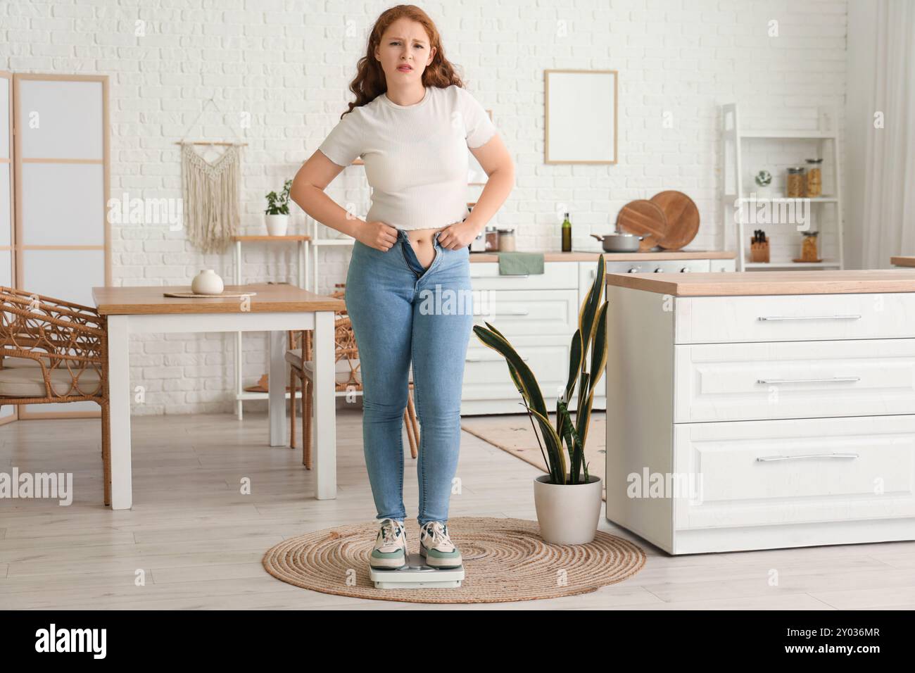 Woman wearing tight jeans hi-res stock photography and images - Alamy