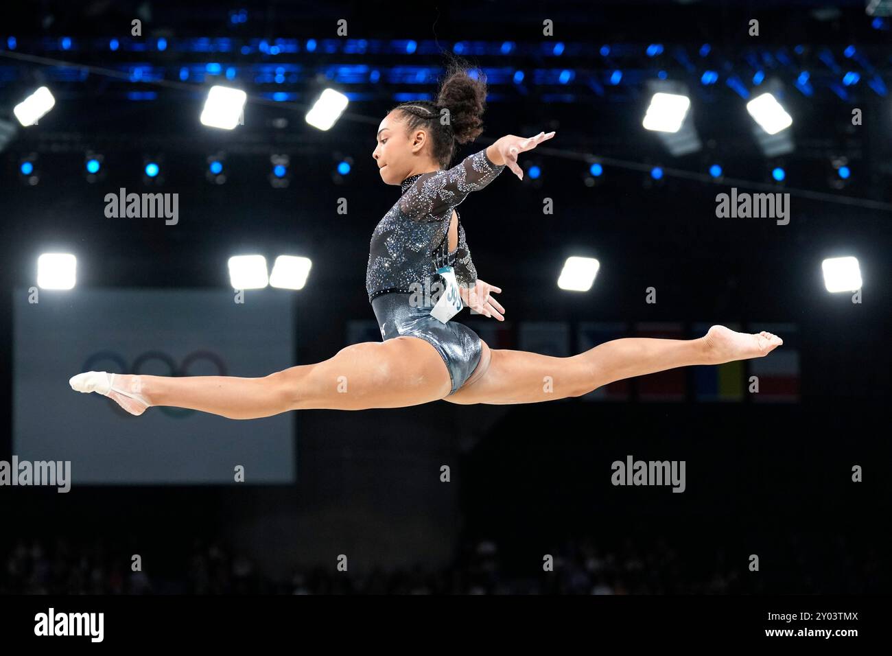 FILE - Hezly Rivera, of United States, competes on the balance beam ...