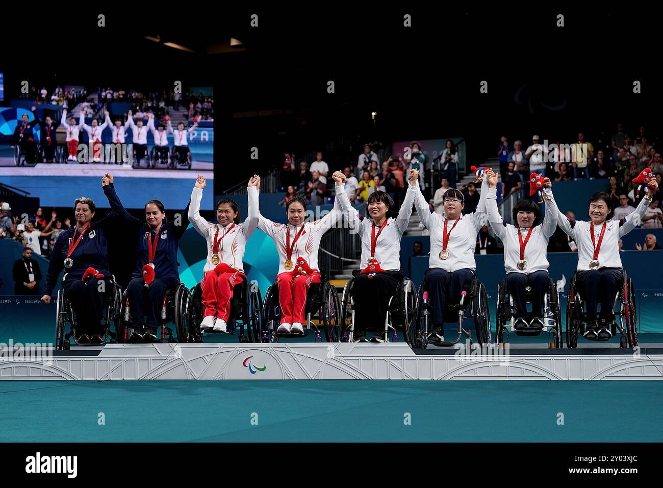 Paris, France. 31st Aug, 2024. Gold medalists Gu Xiaodan (4th L)/Pan ...