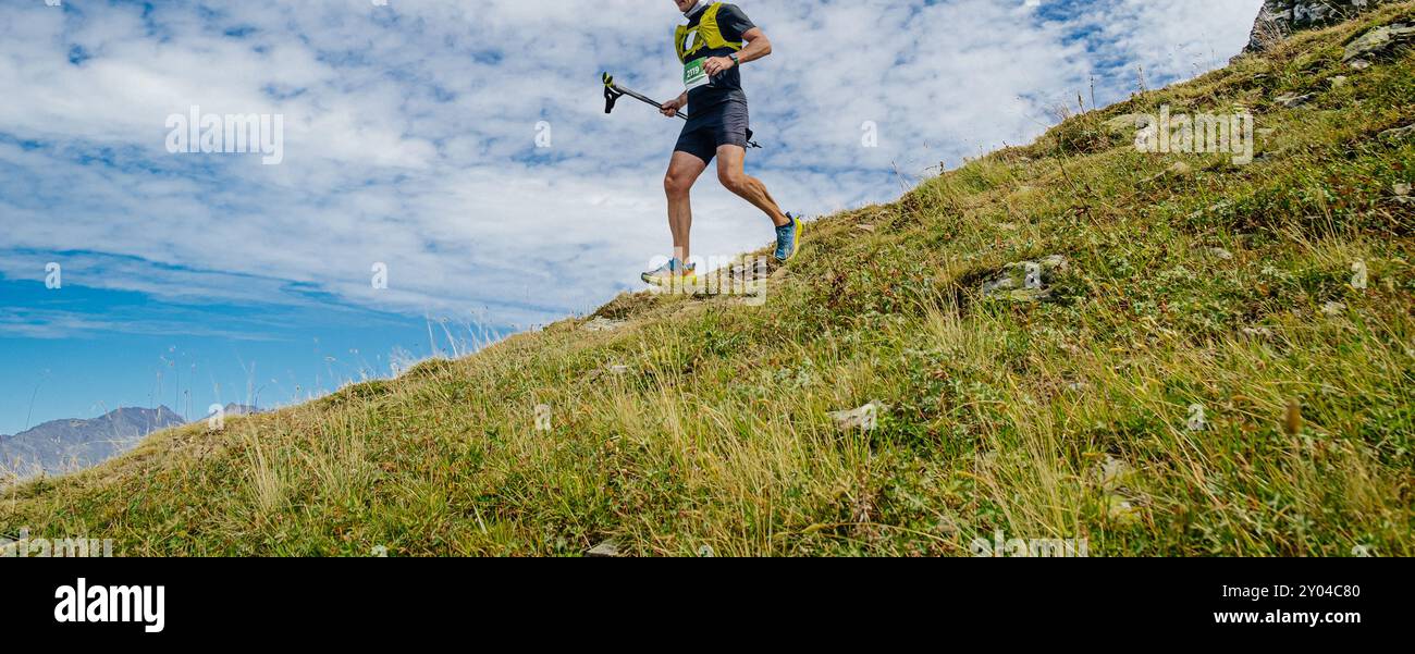 Male runner trekking poles hi-res stock photography and images - Alamy
