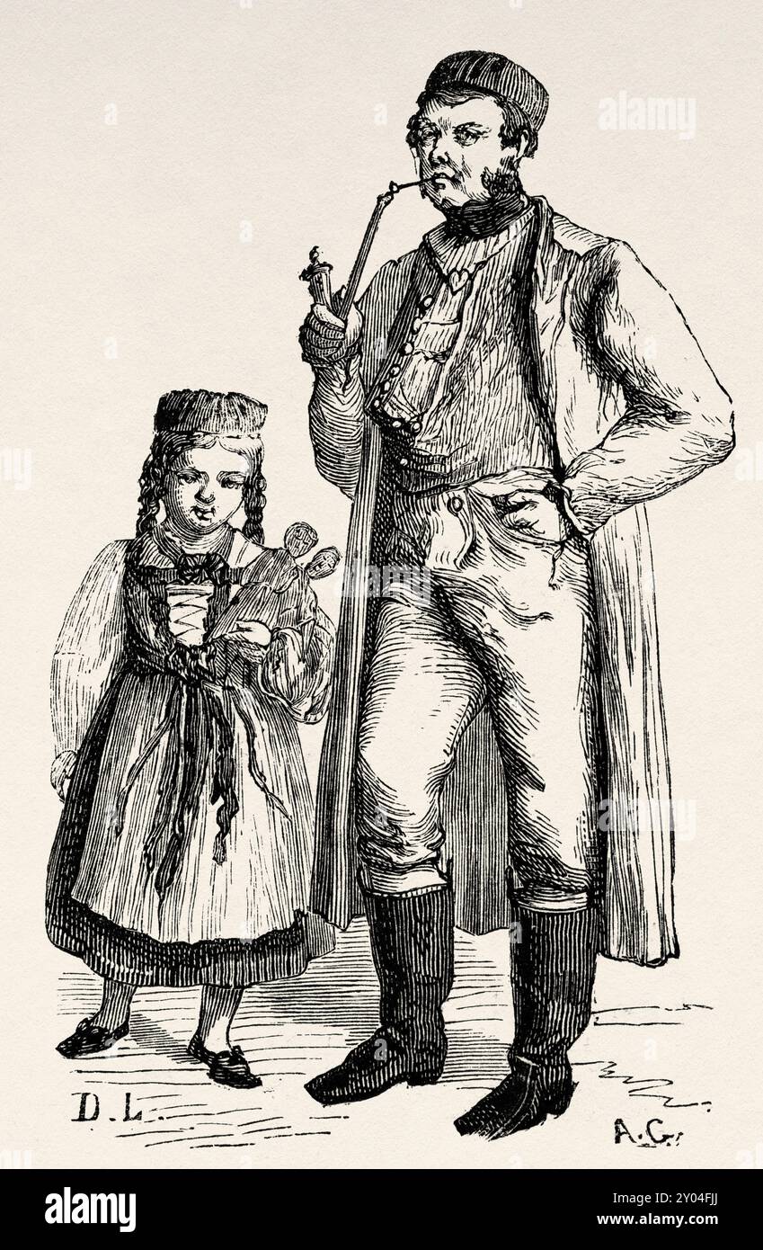 Peasant man dressed in traditional costume smoking a traditional ...