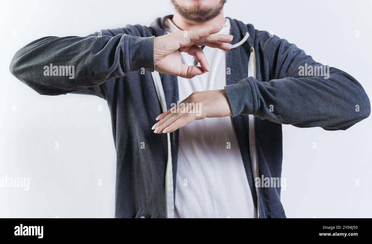 Male interpreter talking in sign language. People talking in sign language isolated. Unrecognizable man gesturing in sign language Stock Photo