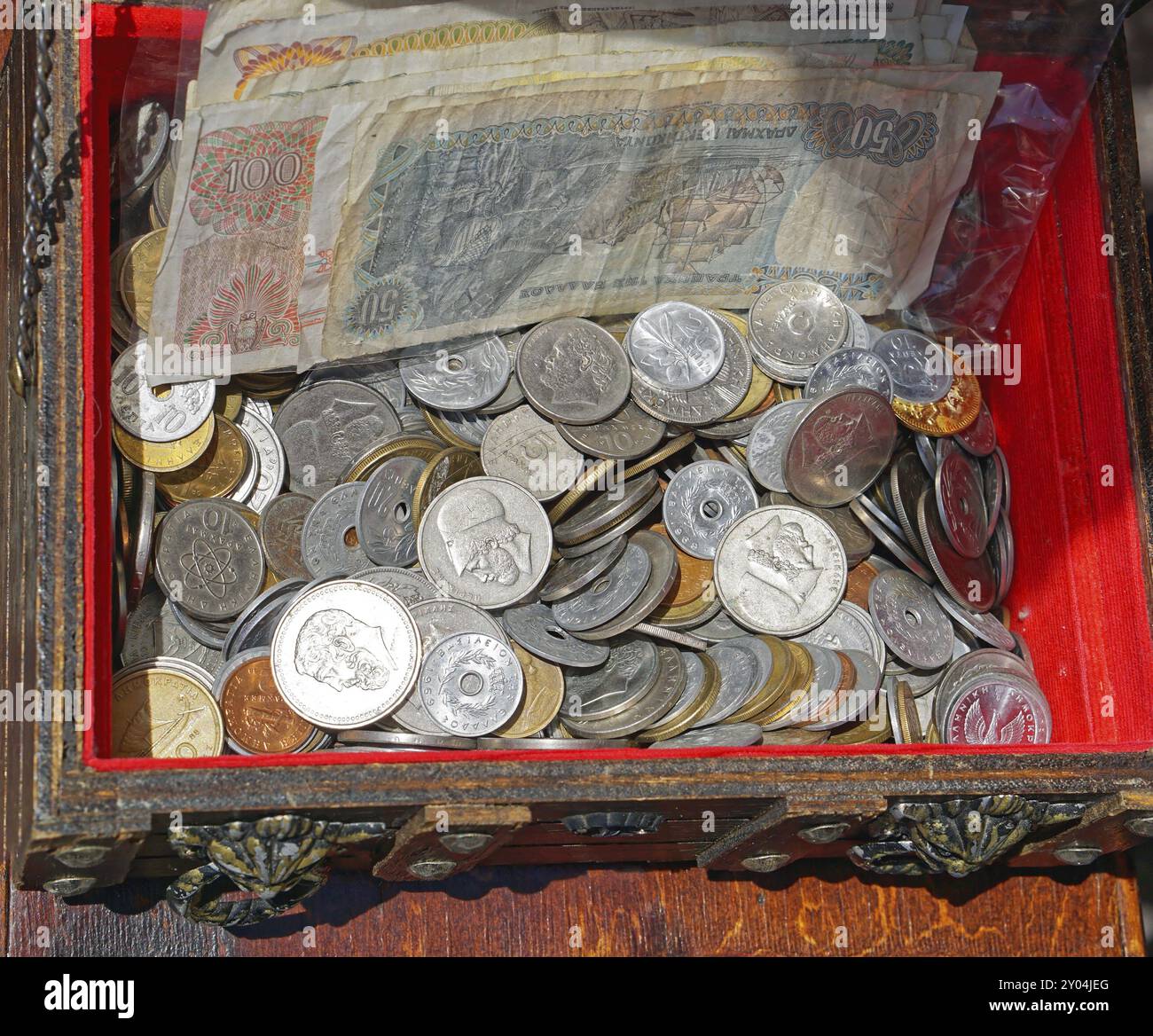 Money In The Box Greek drachma coins and banknote money in the box Stock Photo - Alamy