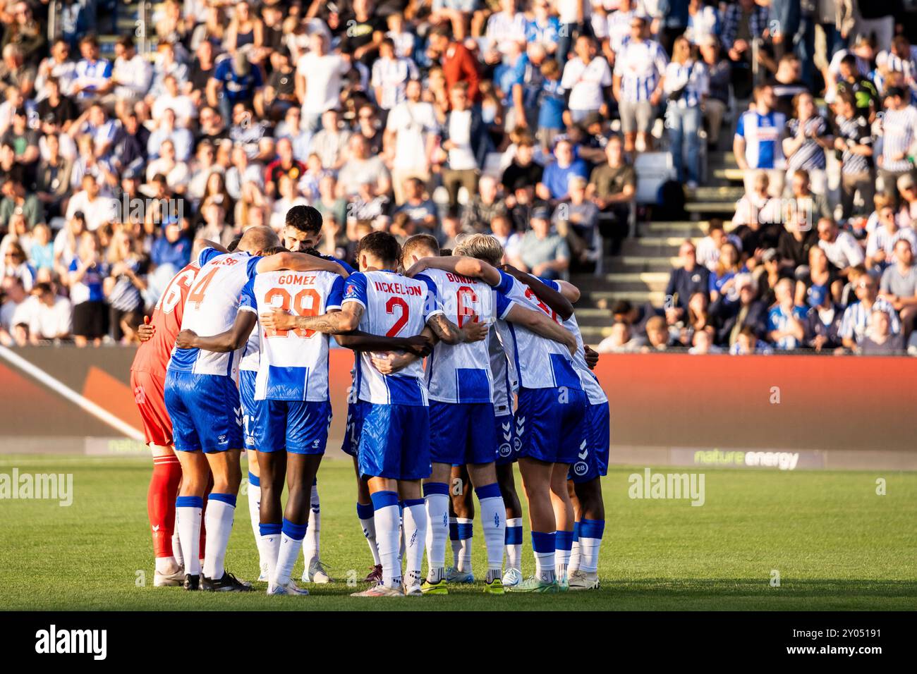 Odense, Denmark. 30th, August 2024. The players of Odense BK unite in a