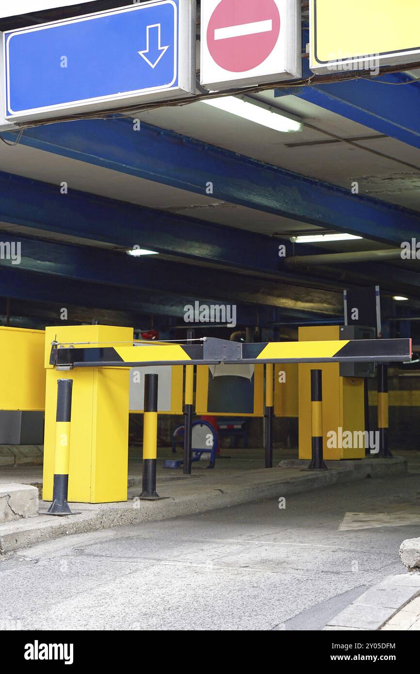 Parking garage entrance with barrier ramp Stock Photo - Alamy