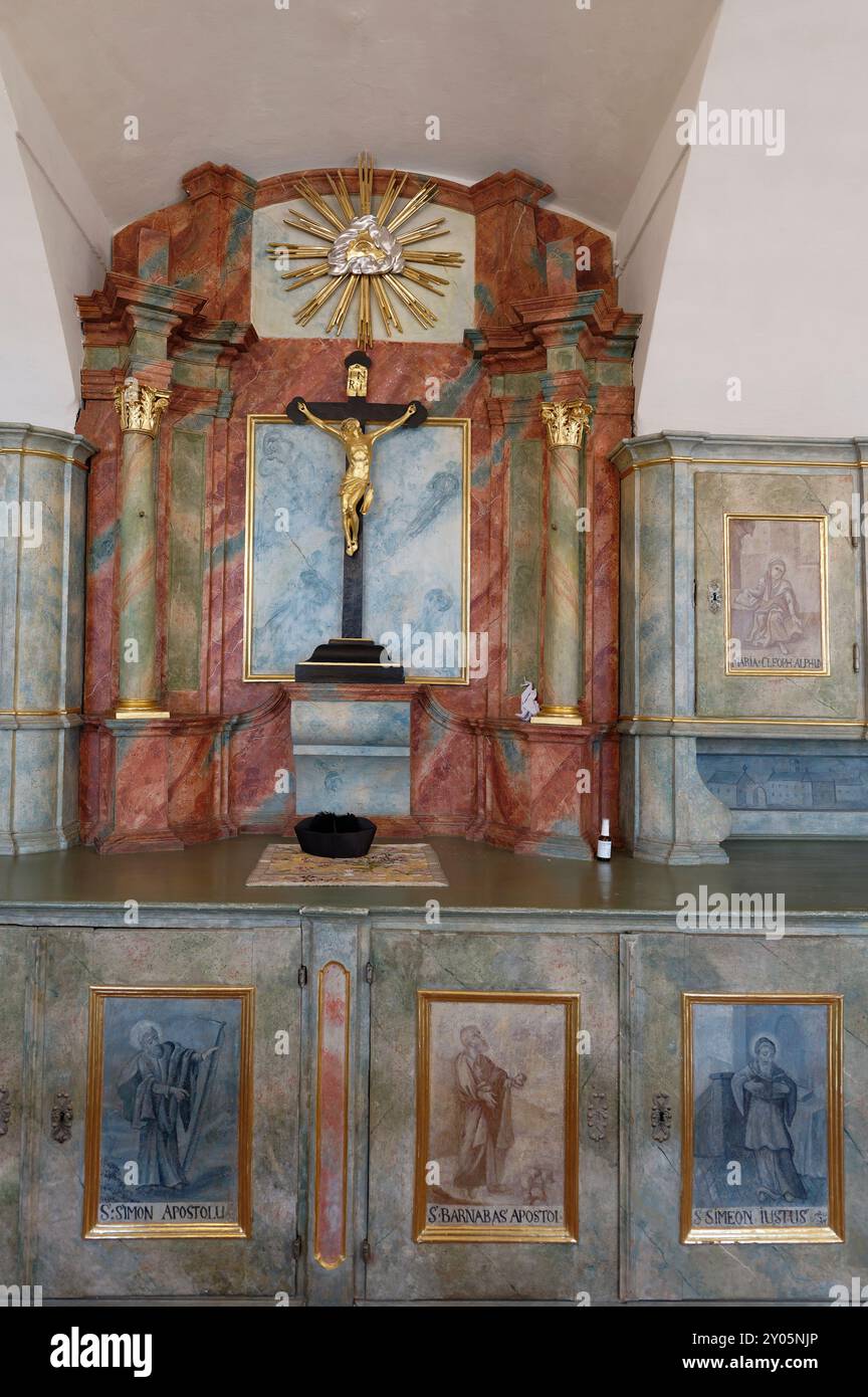 Eisenstadt, Burgenland, Austria. Eisenstadt Mountain Church (Haydn Church). The sacristy of the mountain church. Wooden tall cupboard with painted images of saints Stock Photo