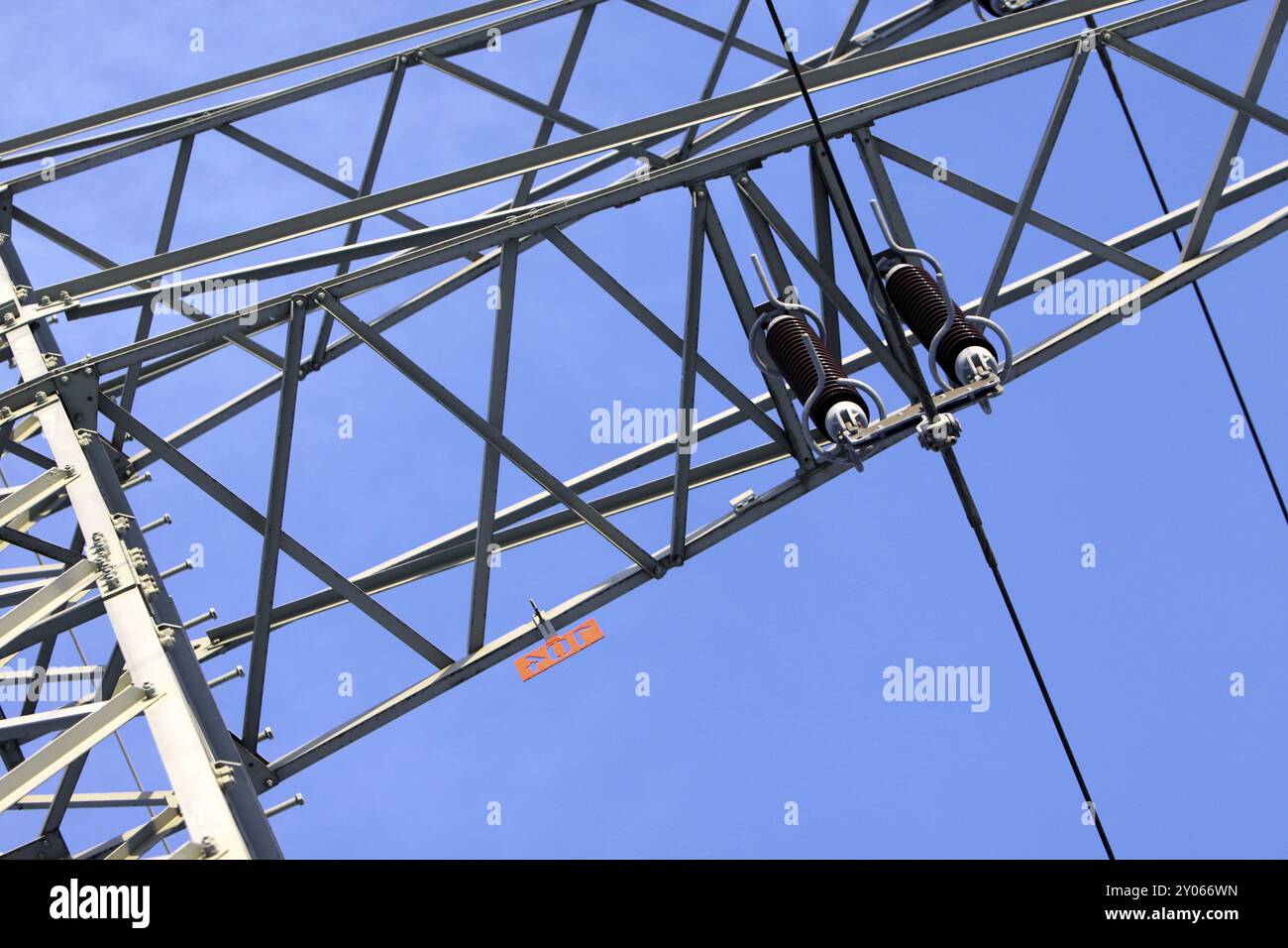 Insulators on a high-voltage pylon Stock Photo - Alamy