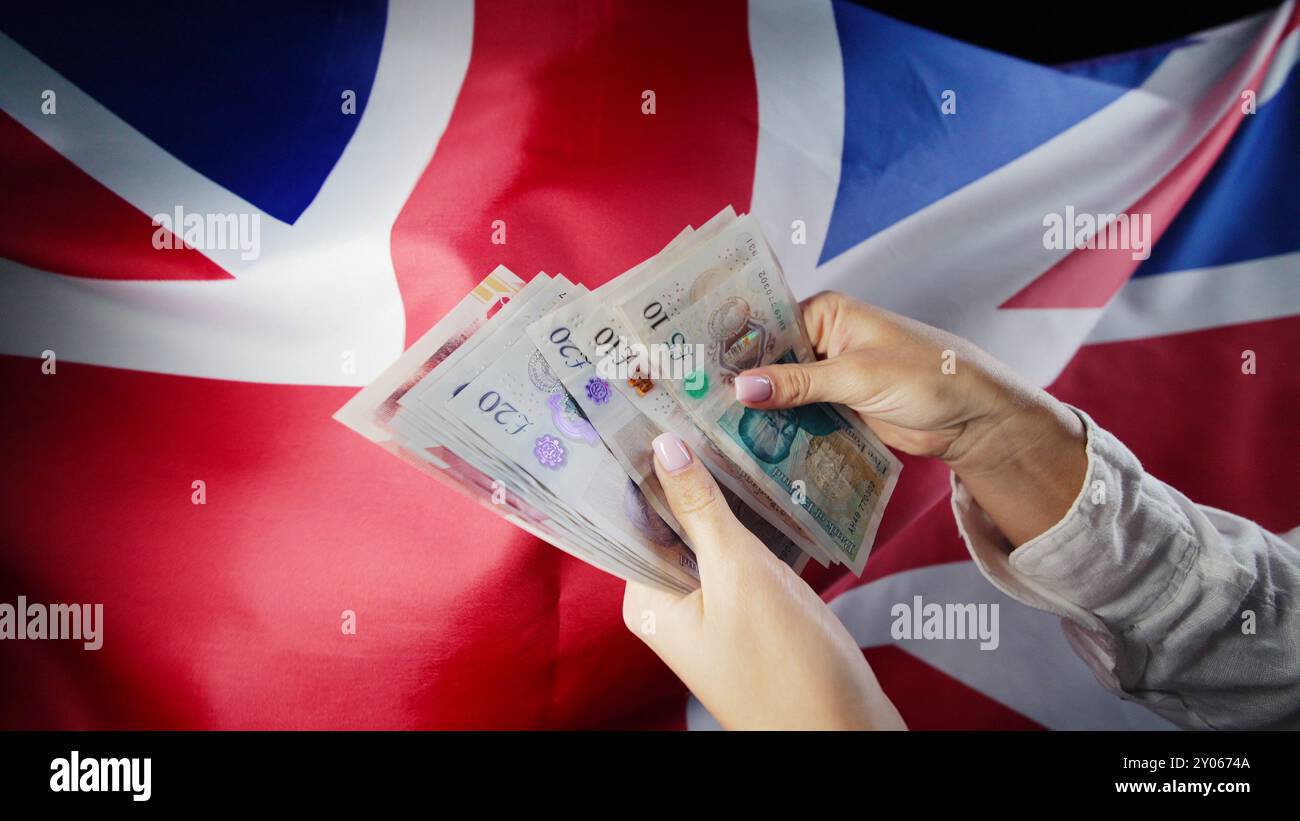 uk-flag-background-woman-counting-hi-res-stock-photography-and-images