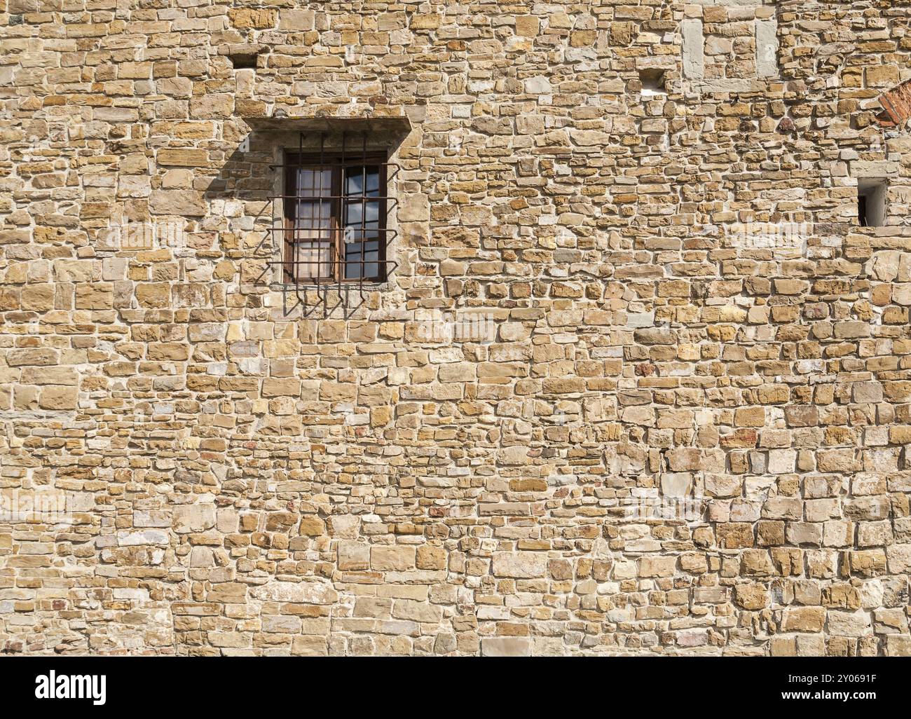 Window in the old stone wall. Natural color Stock Photo - Alamy