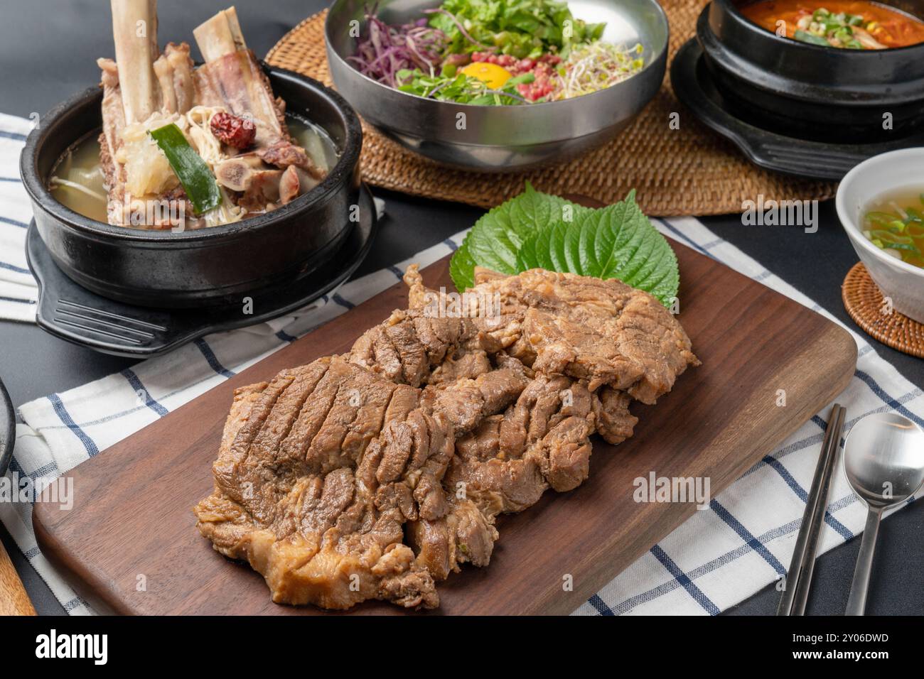 Galbitang, raw beef bibimbap, beef brisket soybean paste stew, raw pork kimchi stew, pork ribs, galbi, kimchi stew, food, meal, meat, dinner, pan, dis Stock Photo